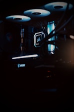 Close-up of a sleek cryptocurrency mining rig with glowing LED lights in a dark room