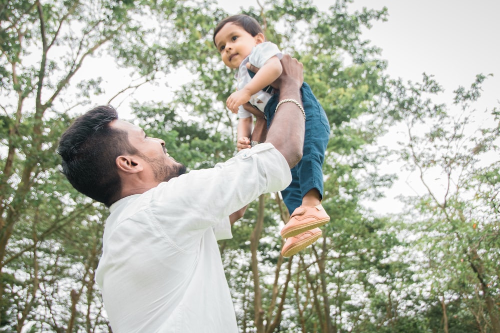 a person holding a baby