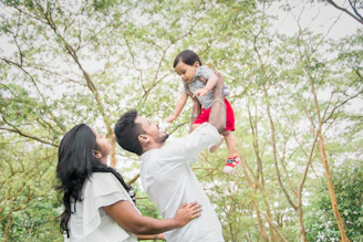 a person holding a baby