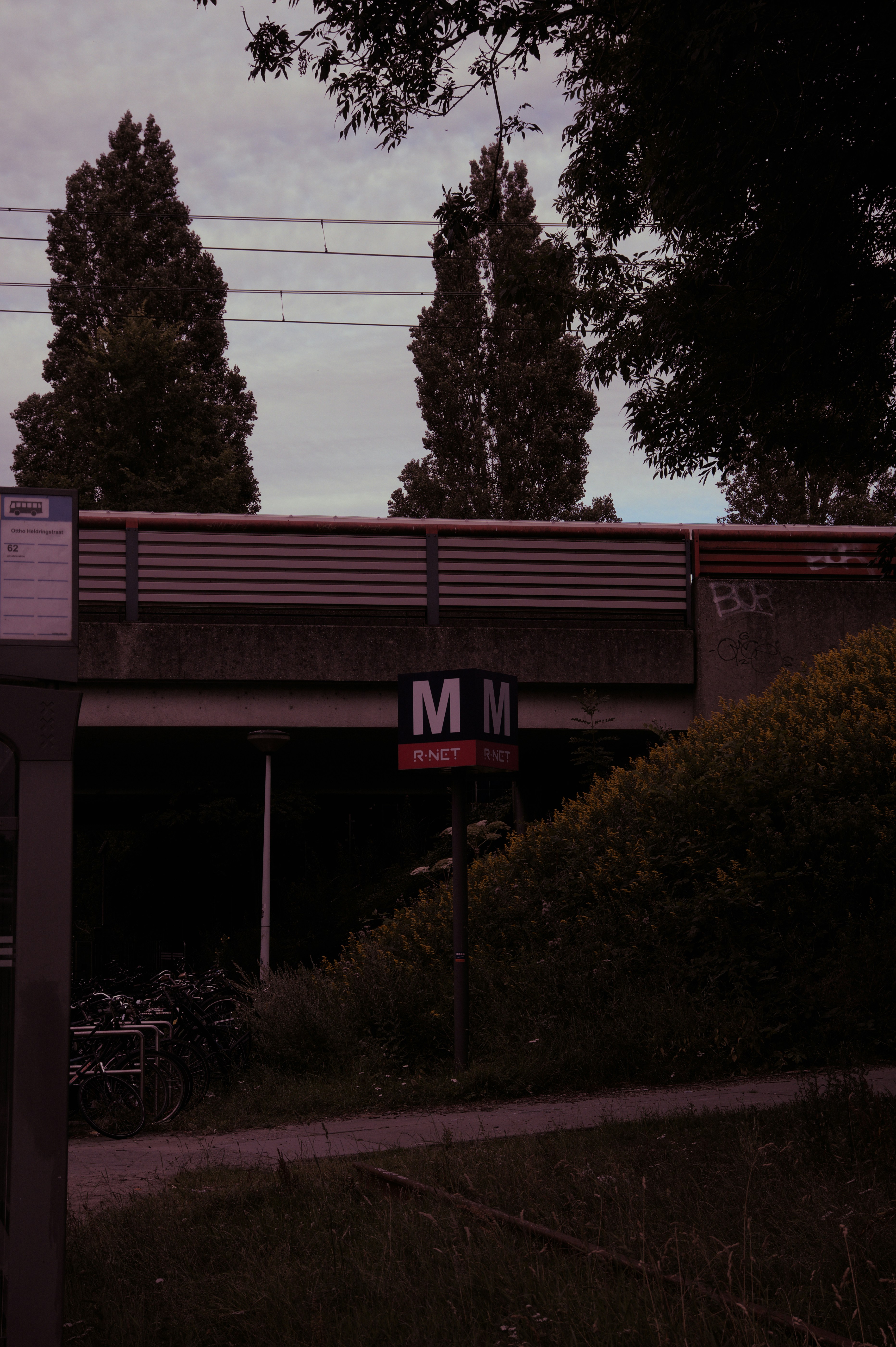 A sign on a bridge photo – Free Image on Unsplash