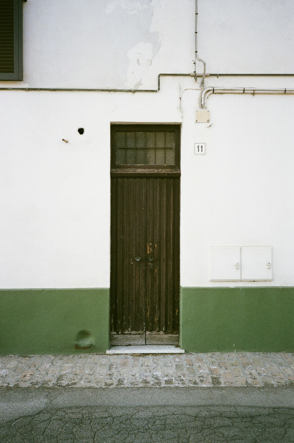 a door in a white building