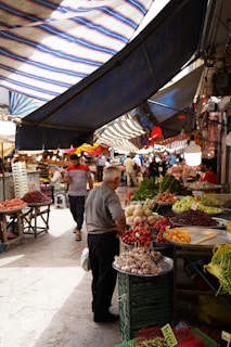 people shopping at a farmers market