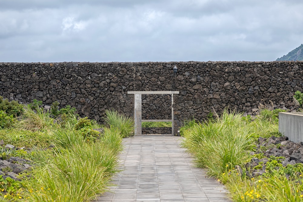 a wooden bench on a path