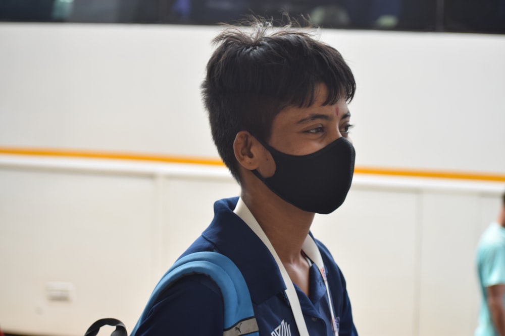 a boy wearing a mask