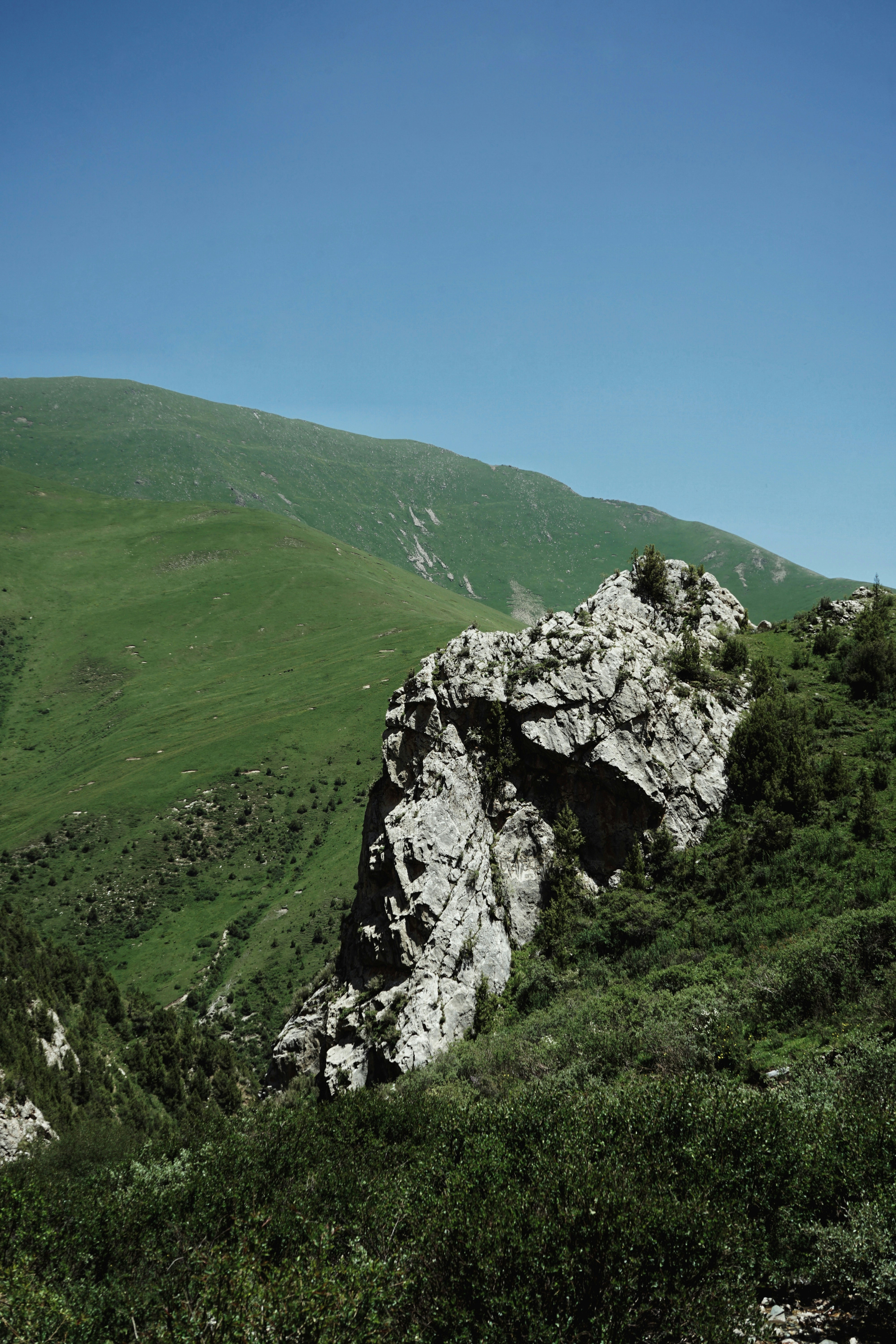 a large rock on a mountain