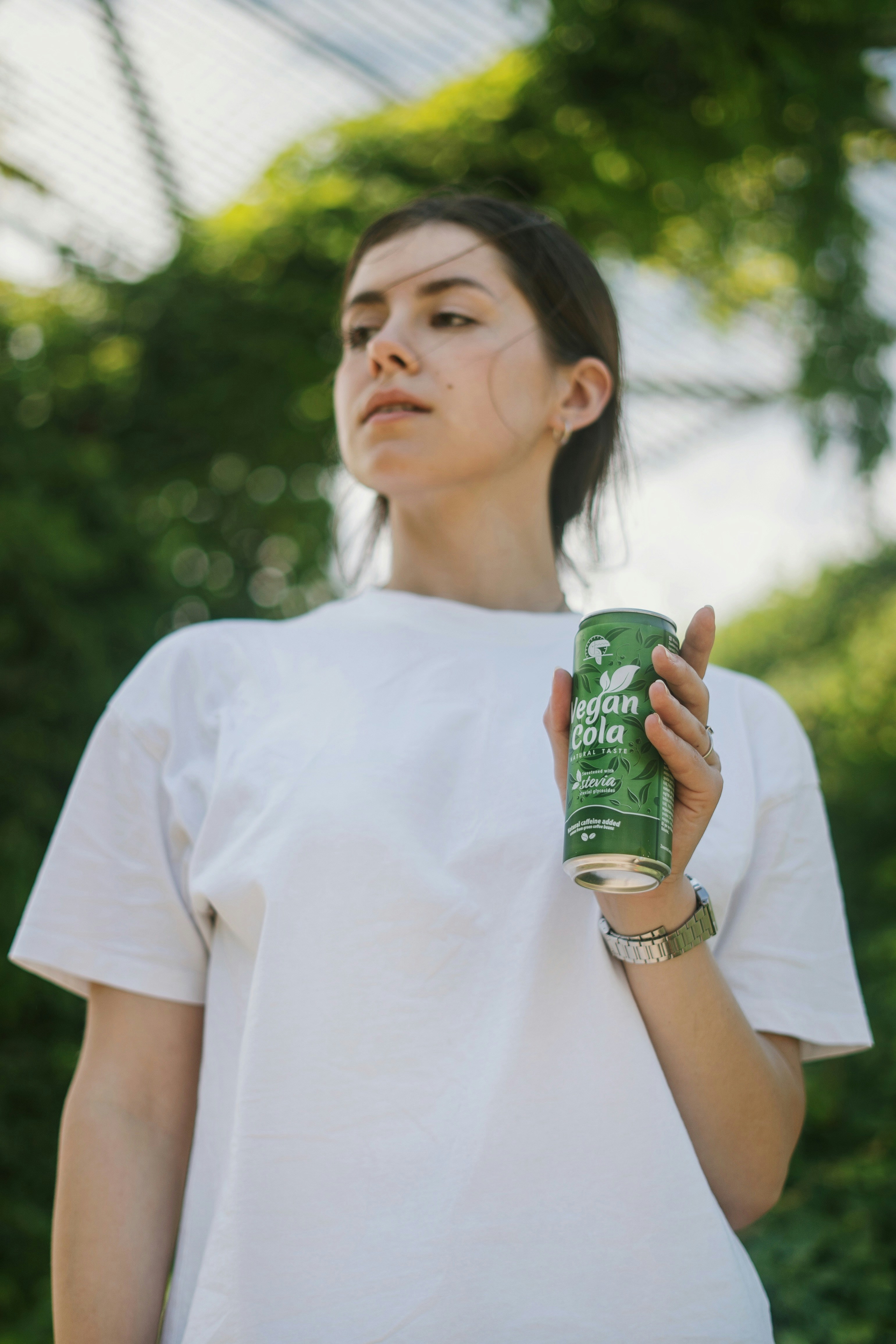 a person holding a can