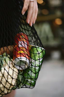 a person holding a tennis ball