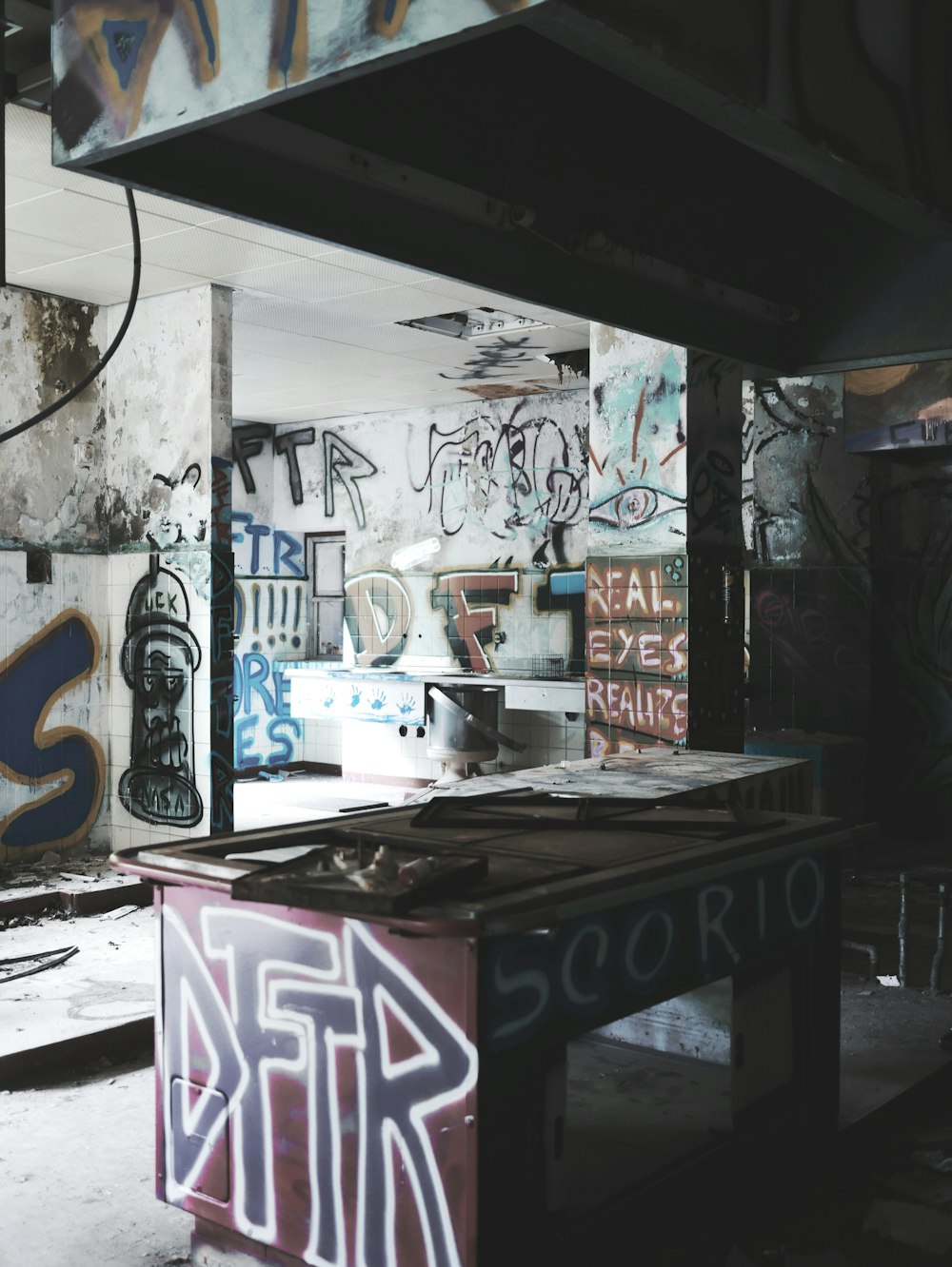 a room with graffiti on the walls