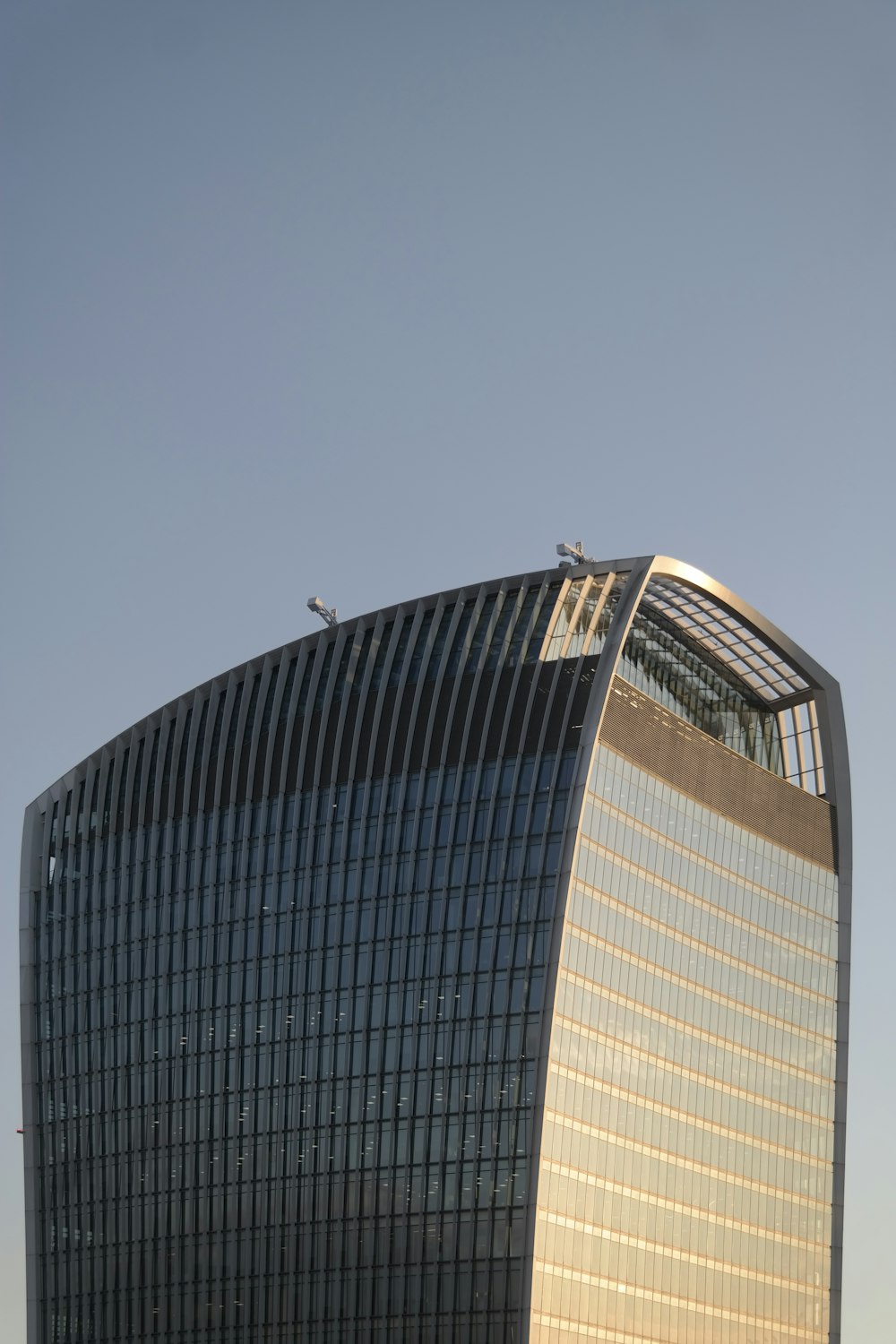 a tall building with a bird on top