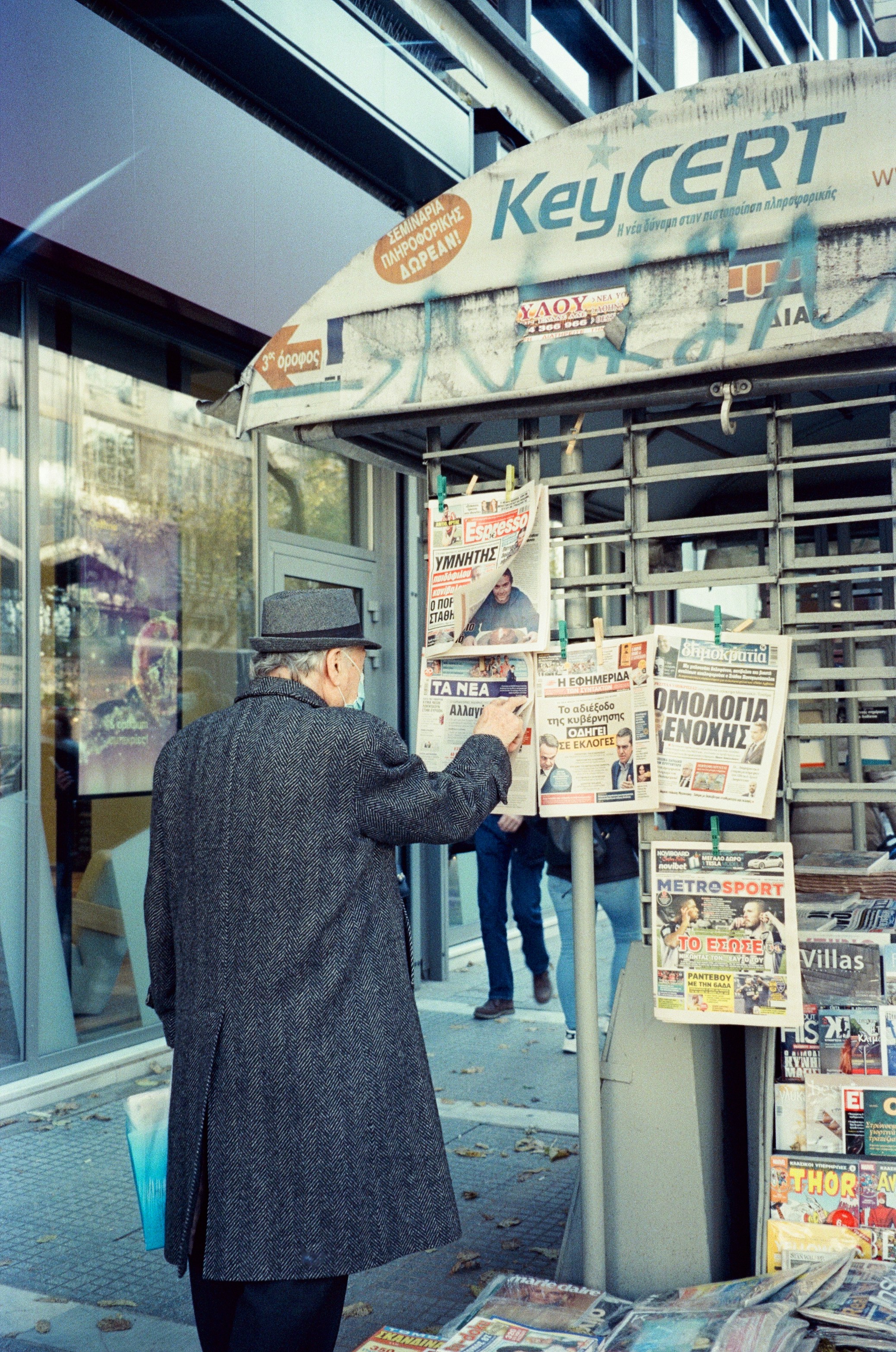 a person standing outside a store