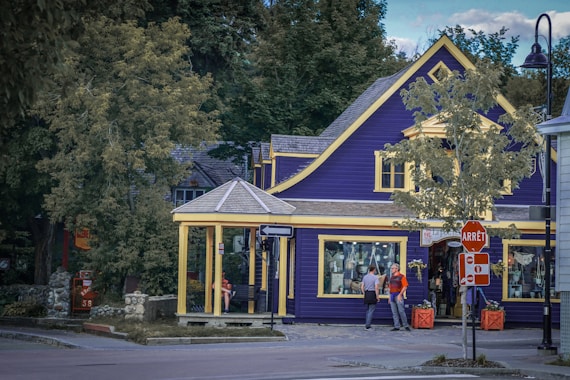 a colorful building with a blue roof