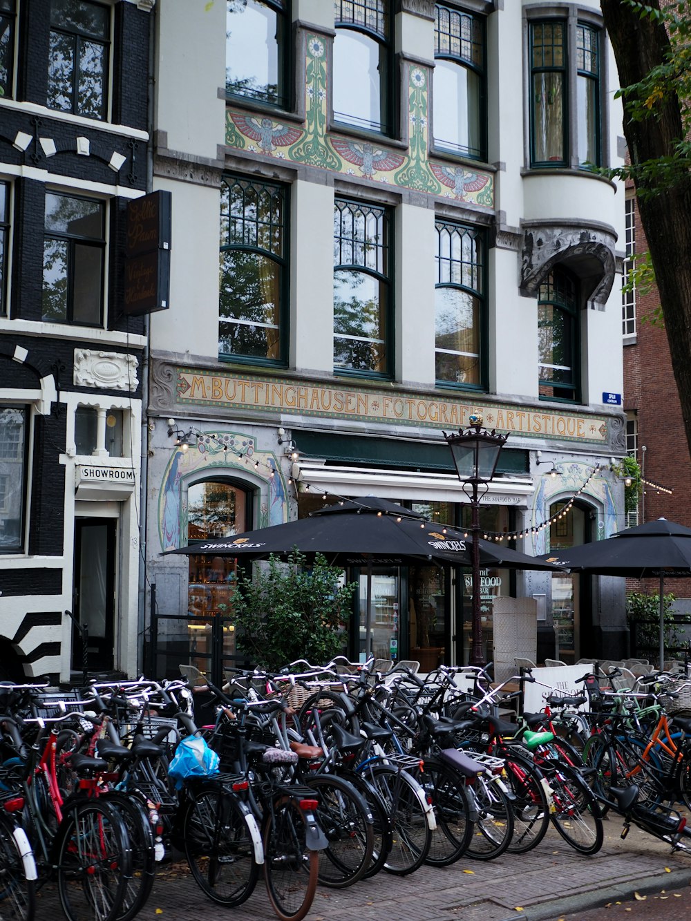 a large group of bicycles parked outside a building