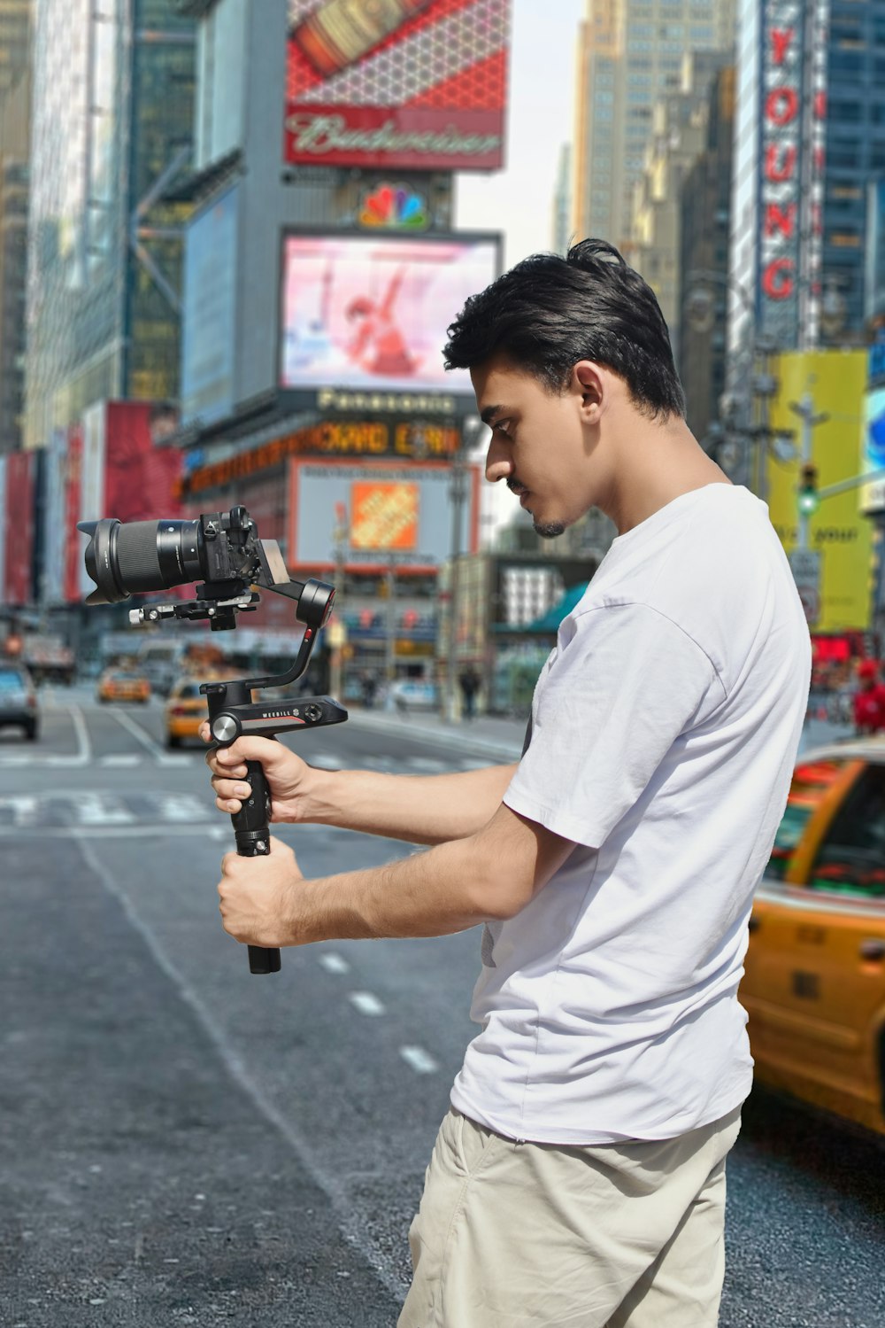 a man holding a camera