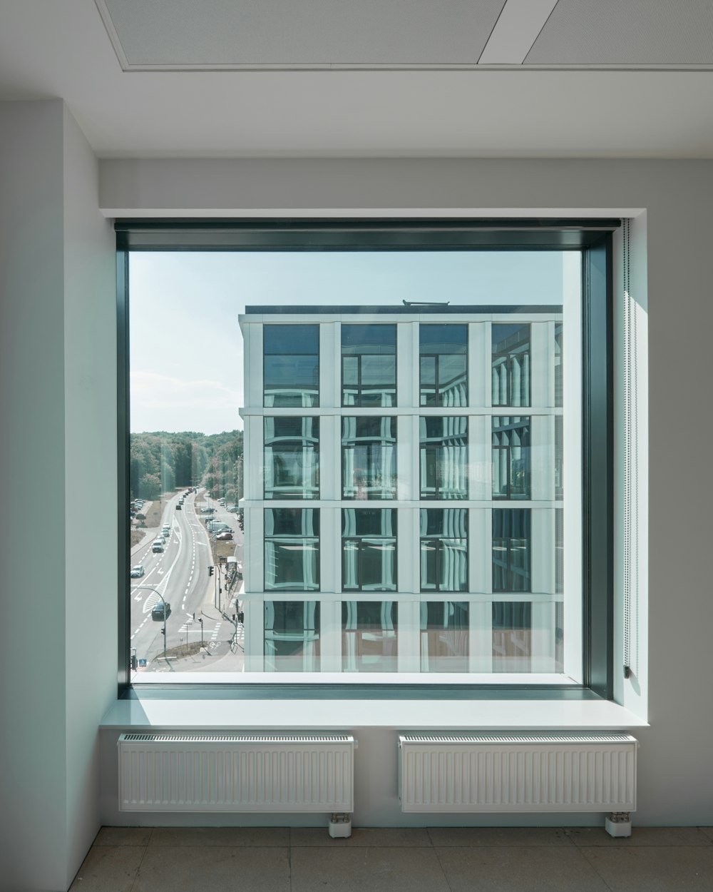 a window with a view of a snowy landscape