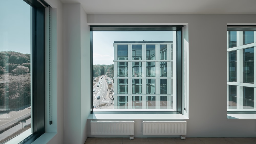 a room with windows and a waterfall