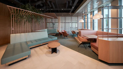 a room with couches and tables