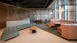 a room with couches and tables