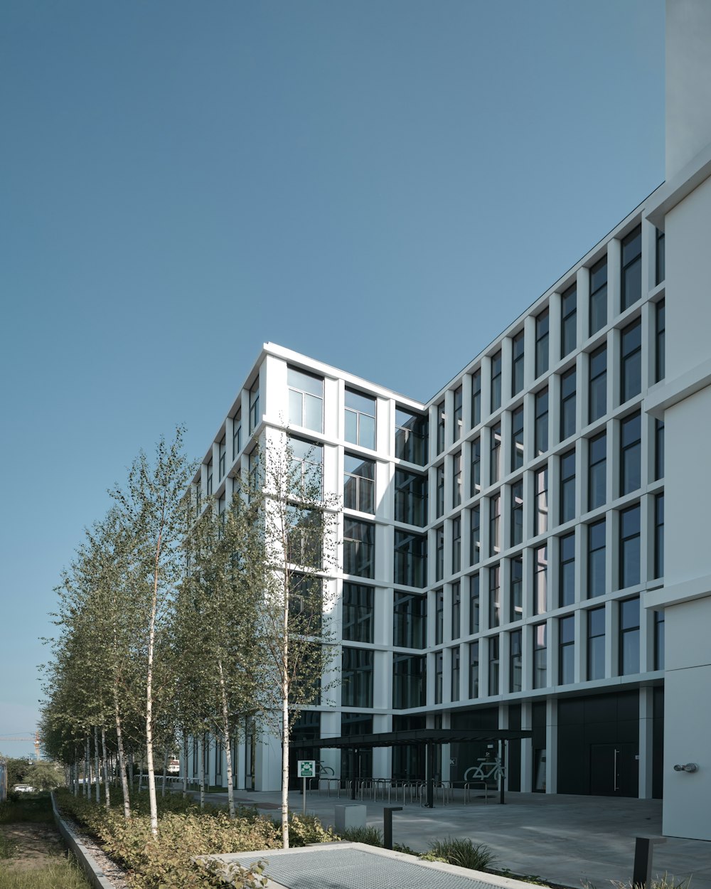 a building with trees in front