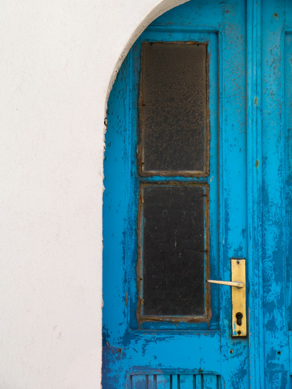 a blue door with a window