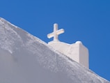 a statue on top of a mountain