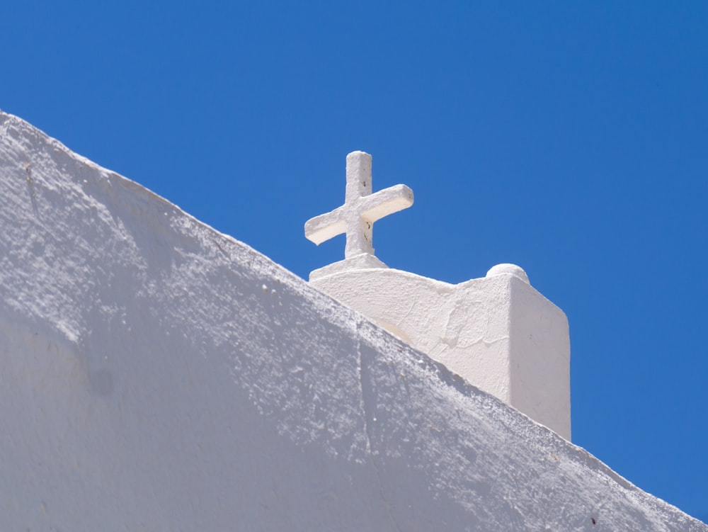 a statue on top of a mountain