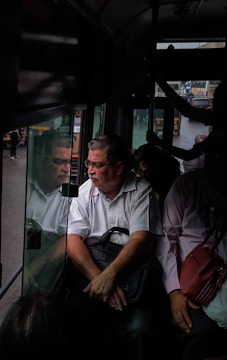 A driver checking cargo manifests before a long-distance trip across India.