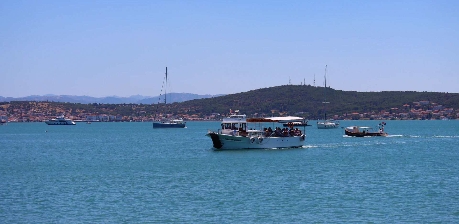 a group of boats on the water