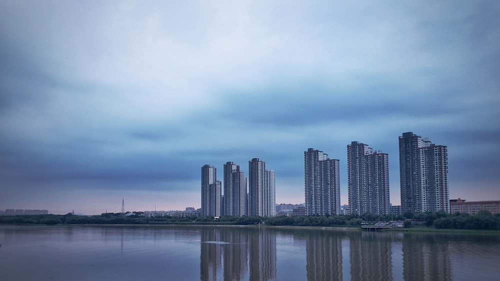 a city skyline by the water