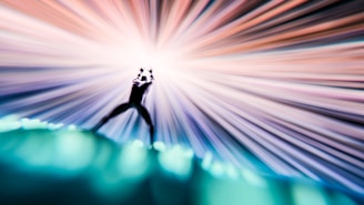 Silhouette of a figure blending into a field of light, symbolizing consciousness as a field.