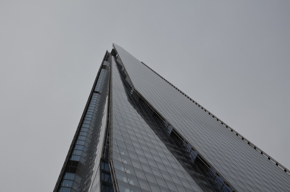 a tall building with a bridge