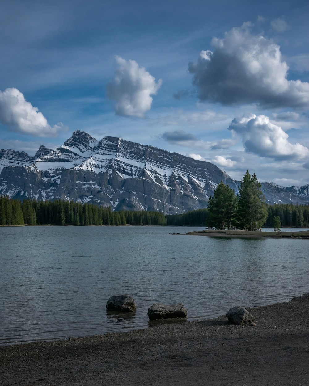 a lake with a mountain in the background