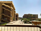 Australian beachside campus with students enjoying outdoor study sessions under clear blue skies