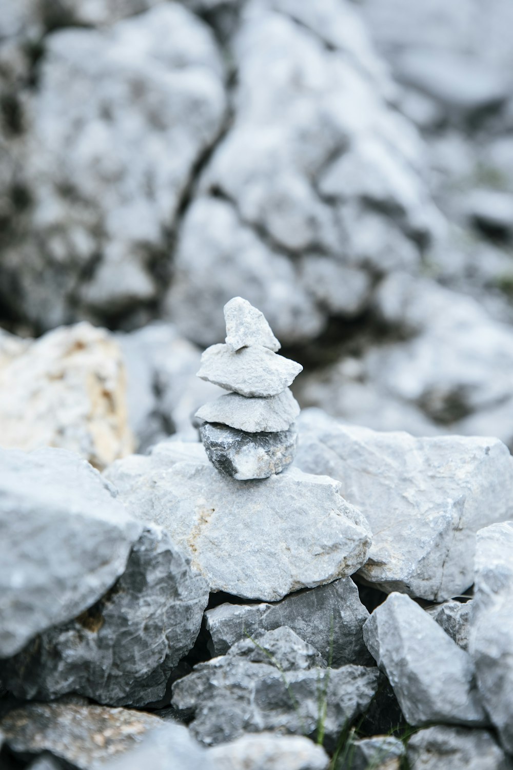 a snowman on rocks
