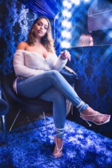A professional woman receiving style advice in a modern, bright consulting room