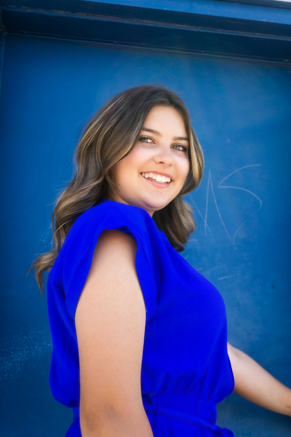 a woman in a blue dress