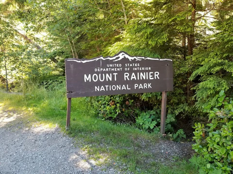 a sign in the woods