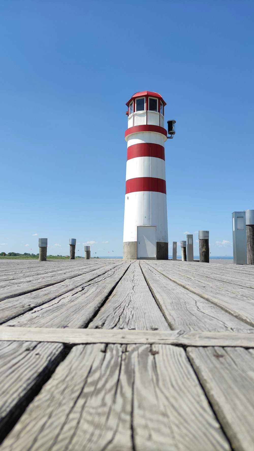 a lighthouse on a pier