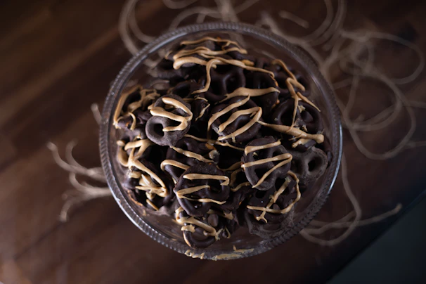A tempting close-up of chocolate-dipped pretzels arranged neatly.
