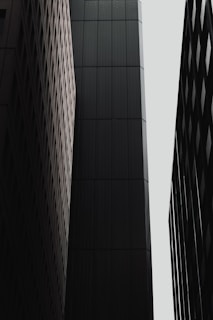 a tall building with a tall glass window