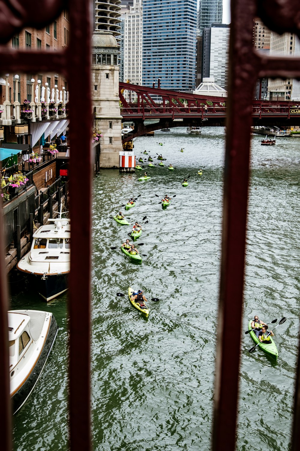 a group of people in kayaks in a river