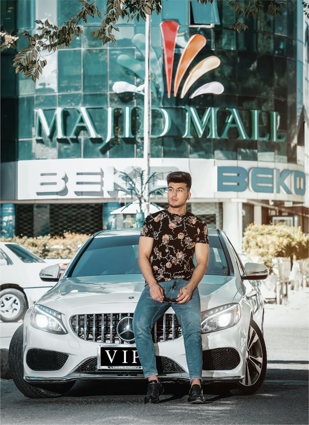 a person sitting on a car