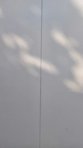 A minimalist black canvas with subtle variations in tone, inviting quiet contemplation.