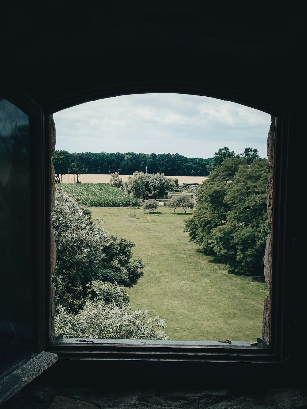 a view of a field through a window
