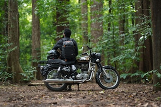 a person sitting on a motorcycle