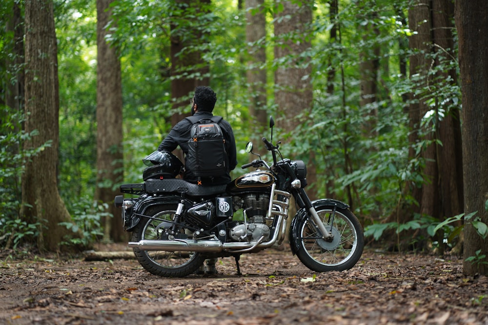 a person sitting on a motorcycle