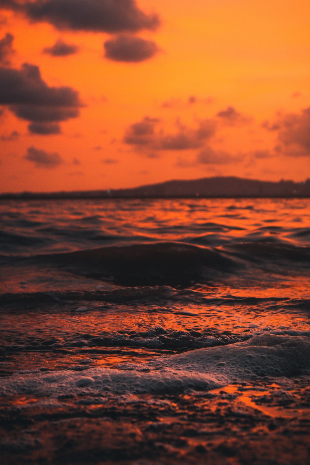 a sunset over a beach