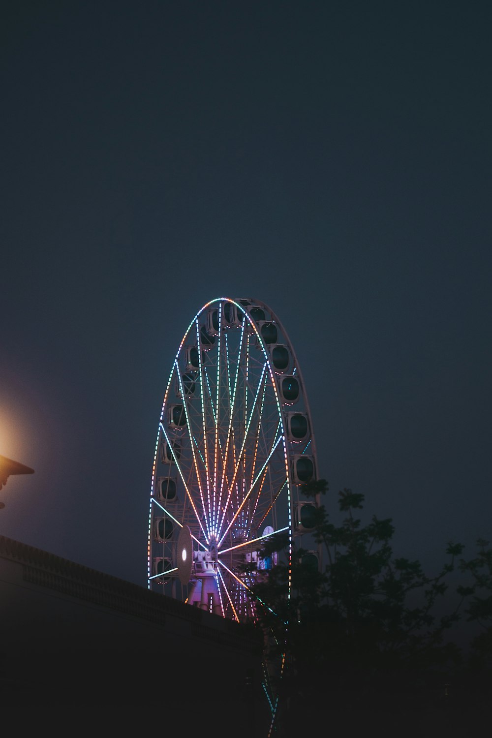 a ferris wheel at night