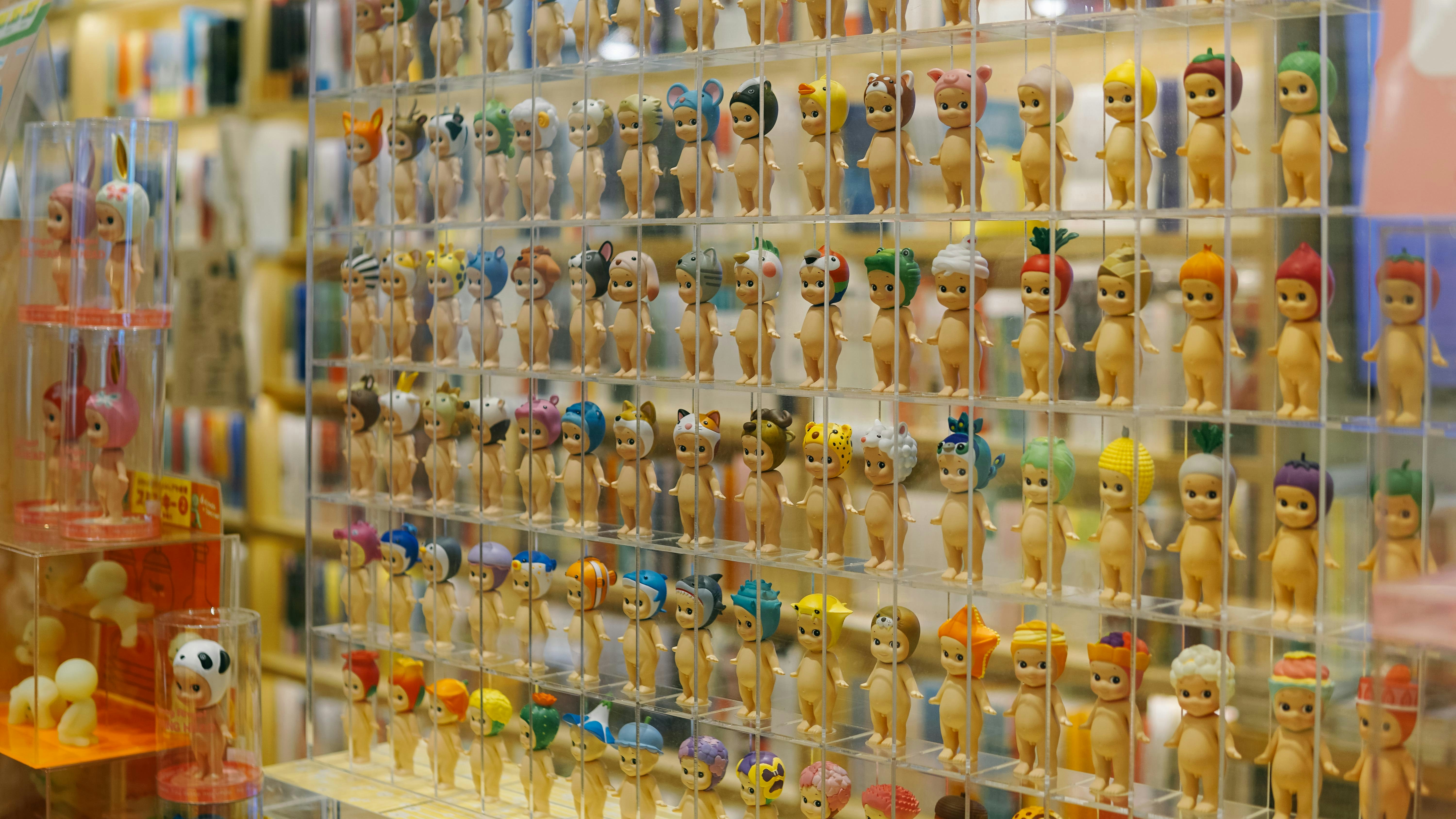 a group of figurines on a shelf