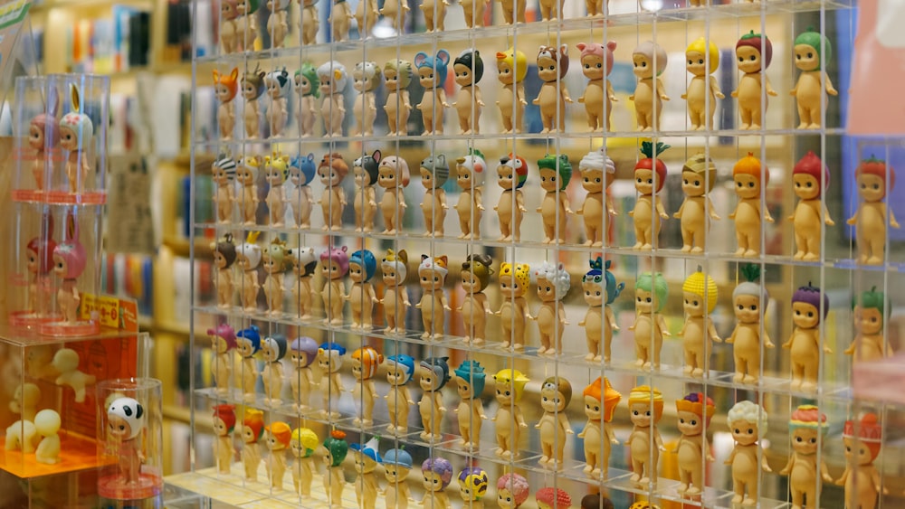 a group of figurines on a shelf