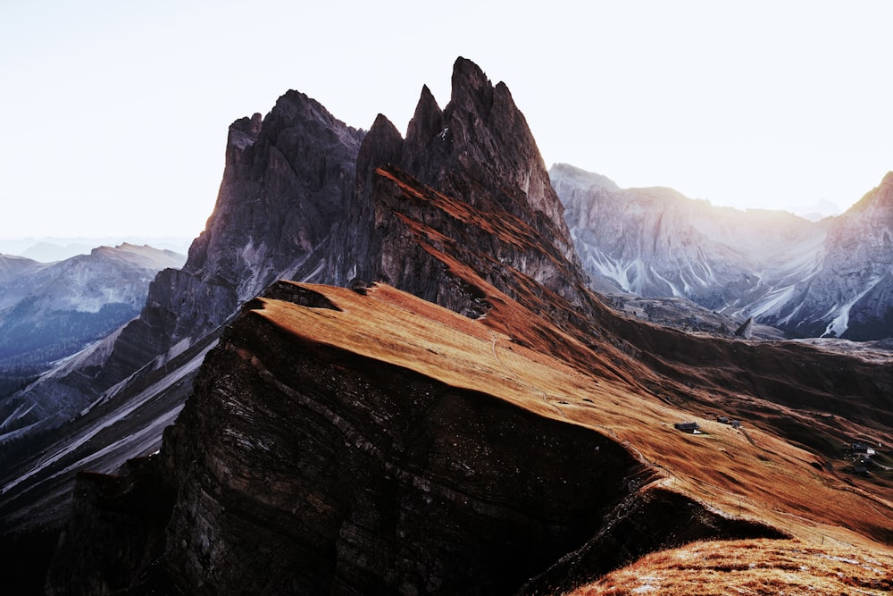 a rocky mountain with snow